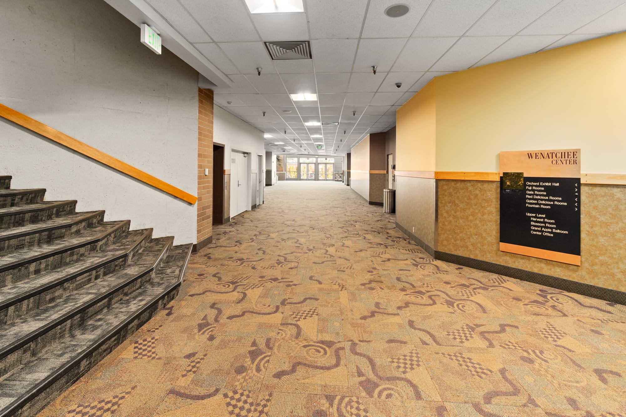 Empty lobby at Wenatchee Center with staircase.